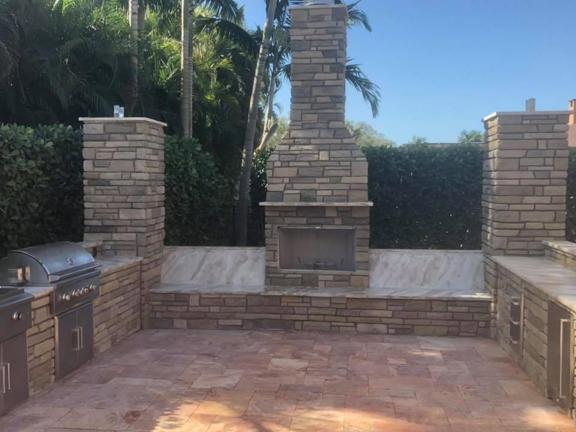 Concrete fire pit and fireplace